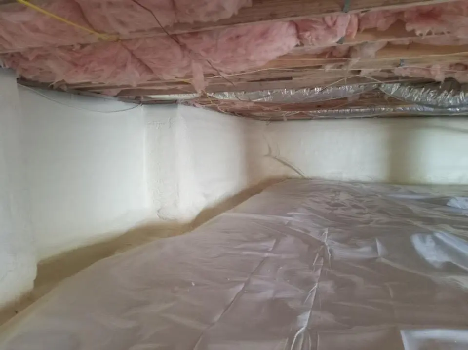 Crawl space encapsulation with closed-cell spray foam for Roof Waterproofing in Manchester